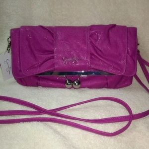 Jessica Simpson magneta bag/clutch/purse